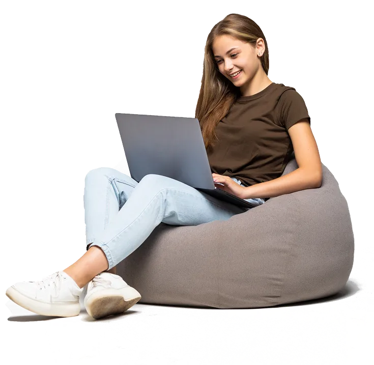 Happy young woman using a laptop