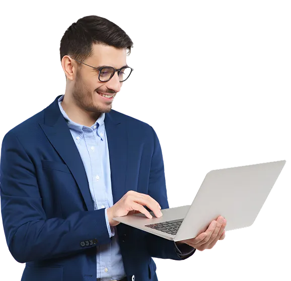 Businessman reviewing work on a laptop